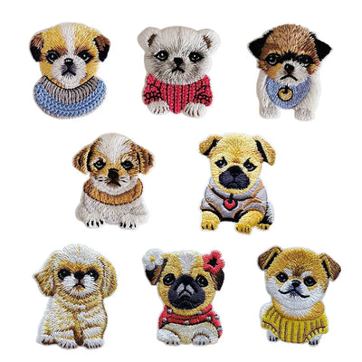 Set of eight embroidered dog designs wearing colorful sweaters on a white background