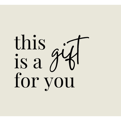 Text 'this is a gift for you' on a beige gift card